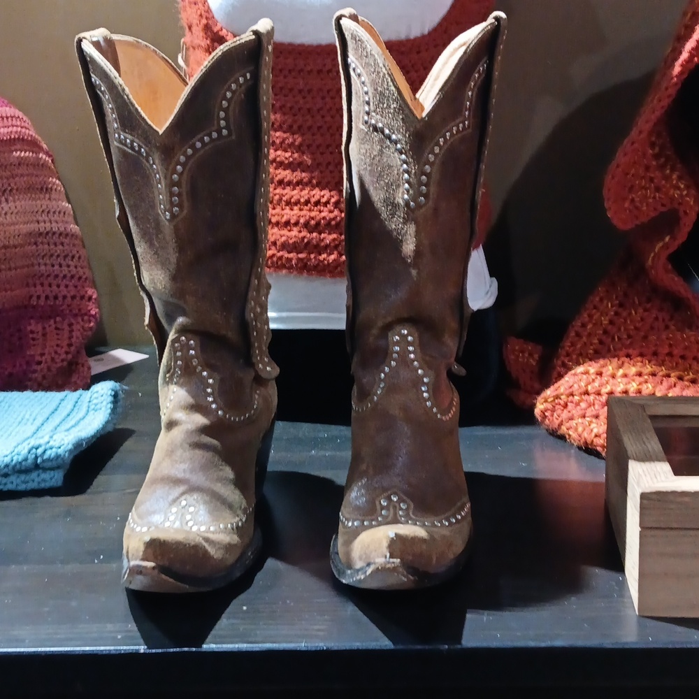 Pair of Worn Light Brown Sueded Leather Cowboy Boots With a Wood Heel